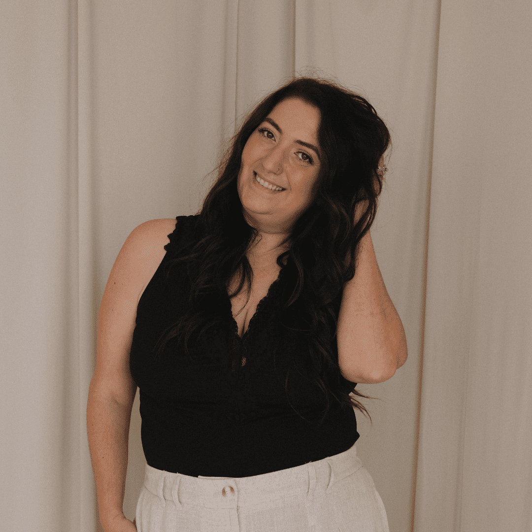 Portrait of Cara Dominguez, a professional stylist at Salon BIJOU, showcasing their expertise and style.
